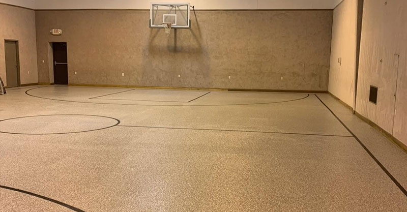 Epoxy flake flooring on West Virginia church basketball court